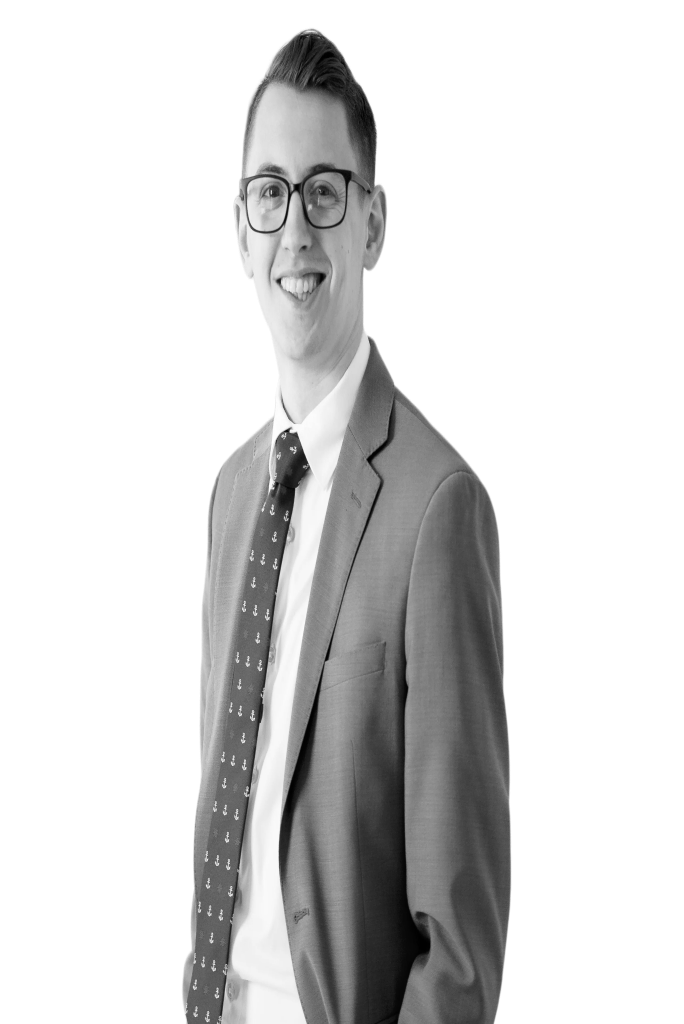 Founder of Uplist in a suit and glasses